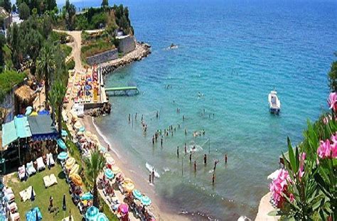 A Beach in Kusadasi in Turkey | Kusadasi, Beach, Green beach