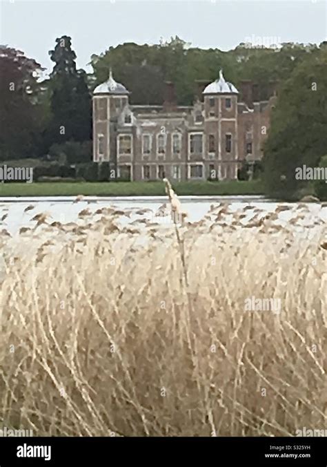 View across lake at Blickling Hall Norfolk Stock Photo - Alamy