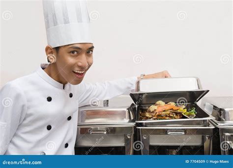 Chinese Chef Showing Food Royalty Free Stock Images - Image: 7704509