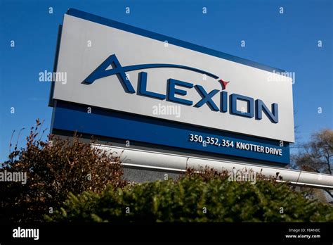 A logo sign outside of the headquarters of Alexion Pharmaceuticals Inc ...