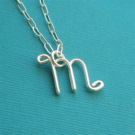 Letter M Necklace - all sterling silver. $30.00, via Etsy.