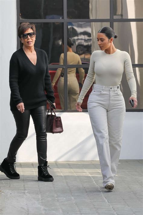 Kim Kardashian, light grey bodysuit, white jeans, silvery grey Yeezy ...