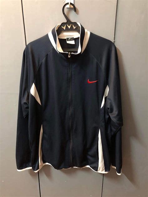 Nike Track Jacket, Men's Fashion, Coats, Jackets and Outerwear on Carousell