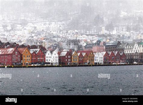 Winter in Bergen, Norway. Snowing heavily. View from the old port of ...