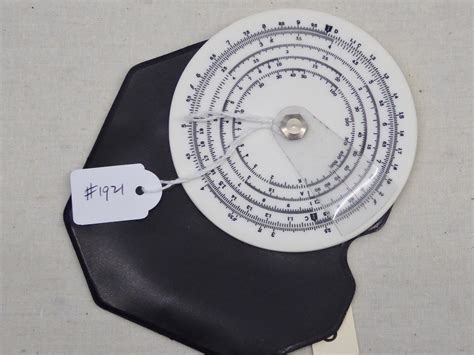 Basic Circular Slide Rule - Physics Museum - The University of Queensland, Australia