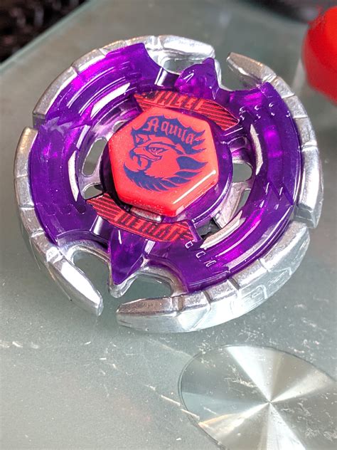 After sitting in a box for 11 years, this Eagle can now fly : r/Beyblade