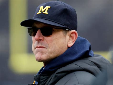 WATCH: Jim Harbaugh's awkward body language to Nick Saban's concern ...