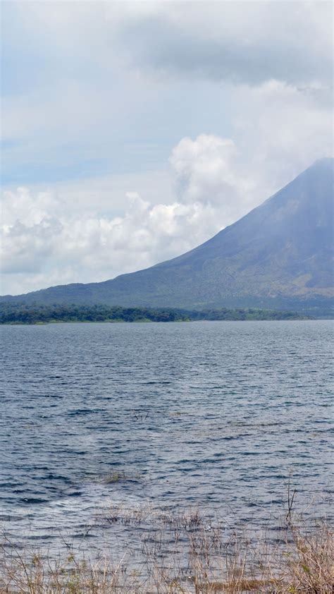 Arenal Volcano from Lake Arenal - backiee