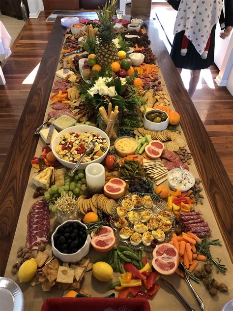 7ft long charcuterie board at a friend's holiday party recently | Party food buffet, Party food ...