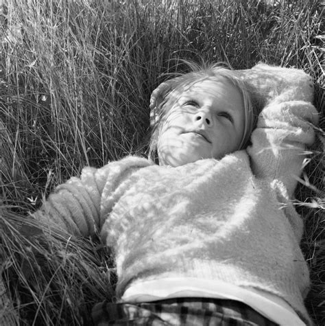 Dorothea Lange: Dyanna Lying on Her Back in the Grass 1961