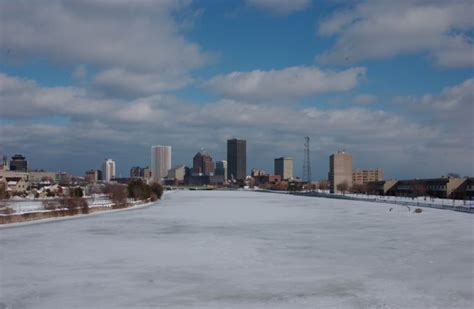 Rochester Skyline, Frozen Genesee River, Clouds and Sunshine. Fresh 12: ...