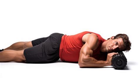 Premium Photo | Man Laying on Ground With Dumbbell