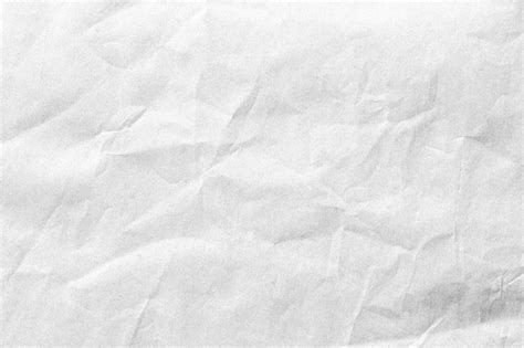 Premium Photo | Crumpled white paper background texture