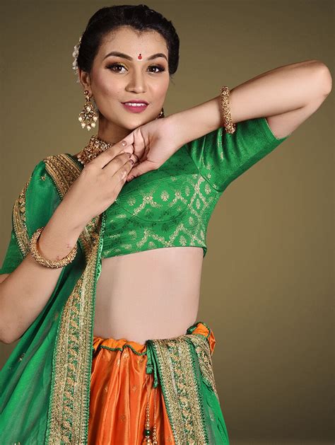 Buy online Orange & Green Self Design Semi Stitched Lehenga from ethnic wear for Women by ...