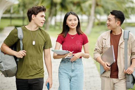 Students Walking on Campus stock image. Image of technology - 271279011