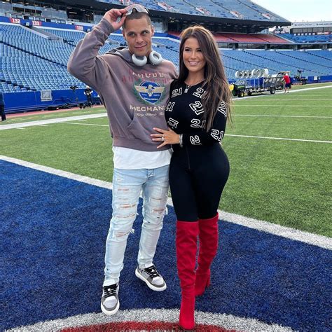 NFL Wag Rachel Bush spills out of tiny crop top as wife of Buffalo ...