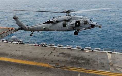 US Navy helicopter disaster: Five sailors hurt and five others still missing after chopper ...