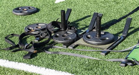 Pull Sleds With Weights On A Turf Field Stock Image - Image of explosiveness, field: 140492943