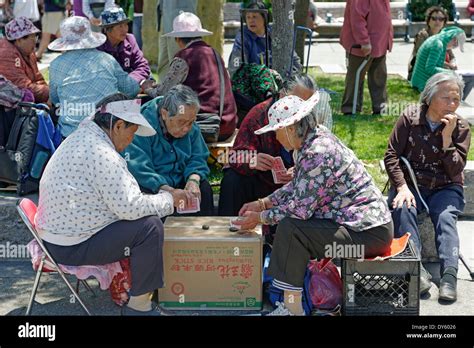 People playing Chinese chess at Portsmouth Square in Chinatown, San ...