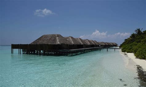 Conrad Maldives: Beach Villa vs. Water Villa | The MileLion