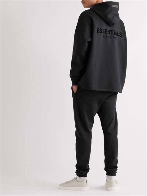 FEAR OF GOD ESSENTIALS Logo-Flocked Cotton-Blend Jersey Hoodie for Men | MR PORTER