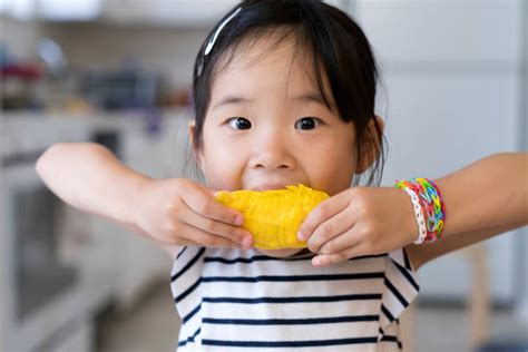 Eating Mango Stock Photos, Pictures & Royalty-Free Images - iStock