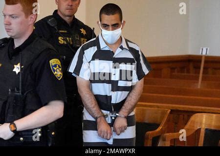 Hadi Matar, 24, center, arrives for an arraignment in the Chautauqua County Courthouse in ...