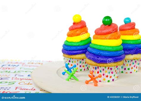 Rainbow birthday cupcakes stock image. Image of confection - 43258201