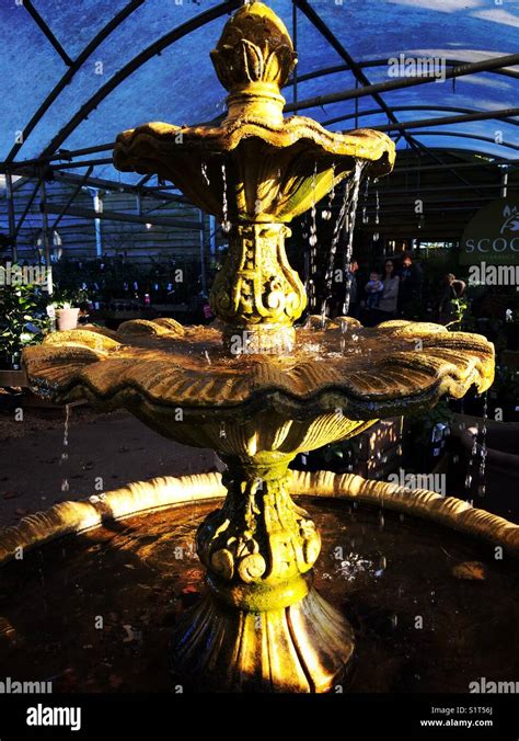 Stone water fountain Stock Photo - Alamy