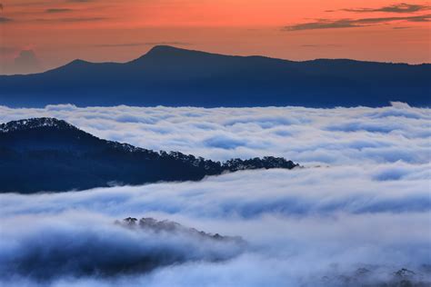 Aerial Photography of Mountain With Clouds during Golden Hour · Free Stock Photo