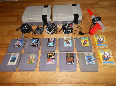 Nintendo Nes - 2x Nes with games and accessories - Catawiki