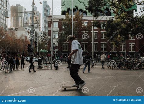 Skateboarder Doing Tricks at a Skate Park in a City Stock Photo - Image ...