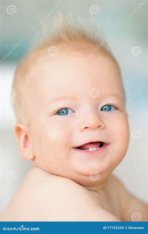 Baby boy with blue eyes stock photo. Image of little - 77762344