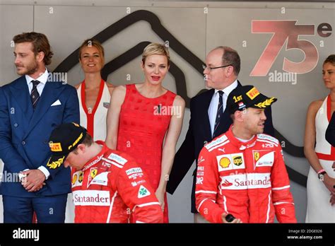 Sebastian Vettel of Germany celebrates his win on the podium with ...