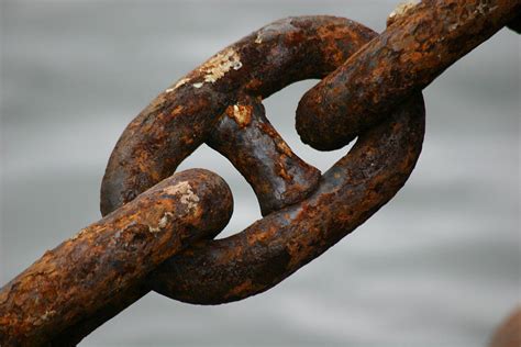 Rusty Chain Photograph by Hans Jankowski