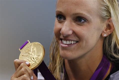 Dana Vollmer set a new world record, winning the 100 meters butterfly competition. - The ...