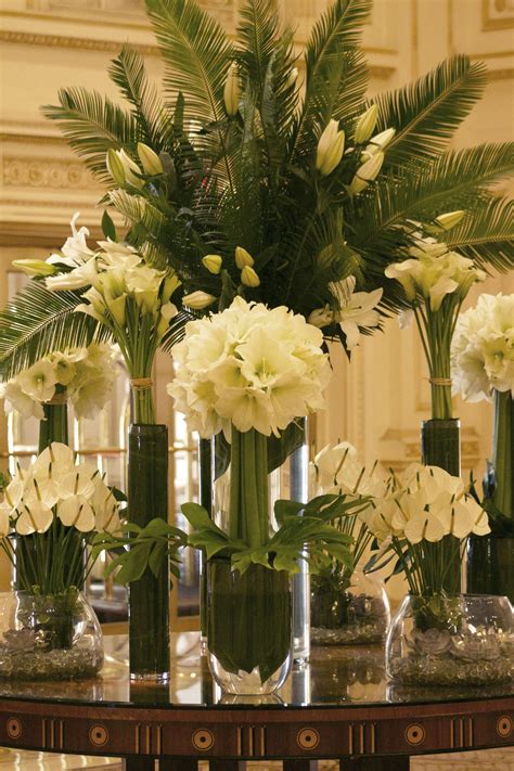 Elegant and simple white and green amaryllis, calla lilies, anthurium, and lilies. Hotel Flower ...