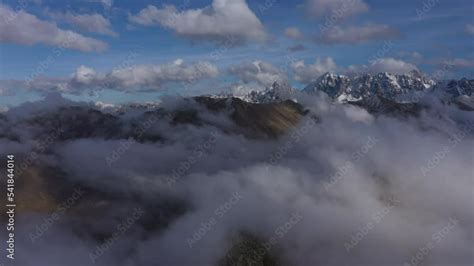 Aerial drone view of mountains above fog clouds Stock Video | Adobe Stock