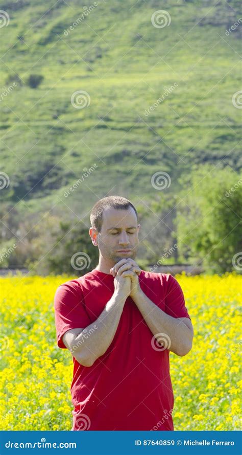 Man Praying Outside in Nature Alone. Stock Image - Image of closed, shirt: 87640859