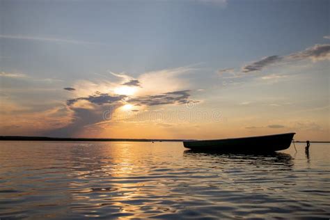 Fishing Boat at the Lake on Sunset Stock Image - Image of outdoors, boat: 206377957