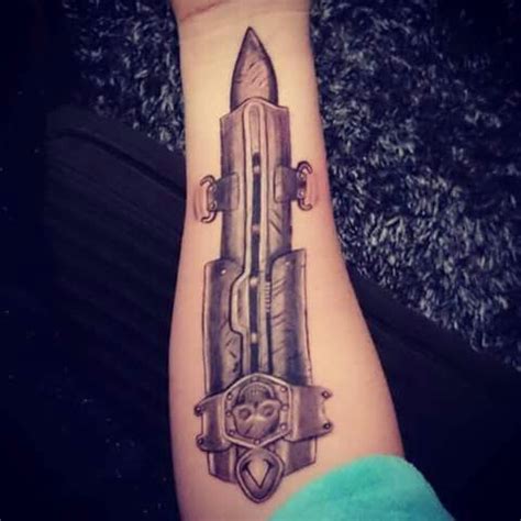 Assassins Creed hidden blade tattoo | Blade tattoo, Tattoos, Assassin's creed hidden blade