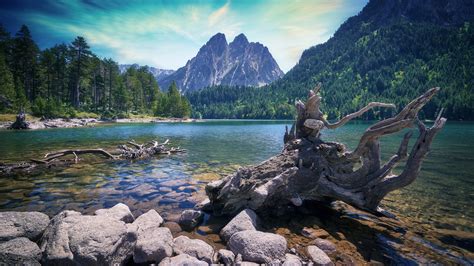 Lake With Clear Water And Stones In Background Of Mountain 4K HD Nature ...