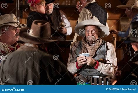 Cowboy With Poker Face Royalty Free Stock Image - Image: 24883236