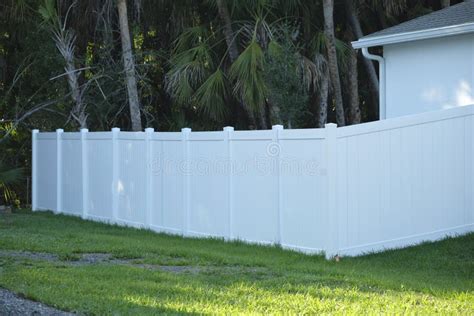 White Plastic Fence for Back Yard Protection and Privacy Stock Photo - Image of private, farm ...