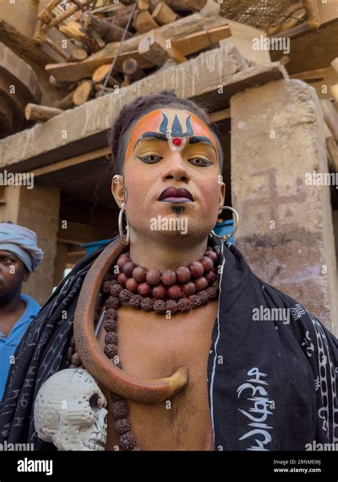 Masan Holi, Portrait of an male artist with painted face act as lord ...