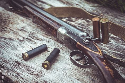 double-barrel rifle with cartridges Stock Photo | Adobe Stock