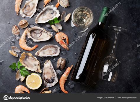 Fresh seafood and white wine — Stock Photo © karandaev #153448764