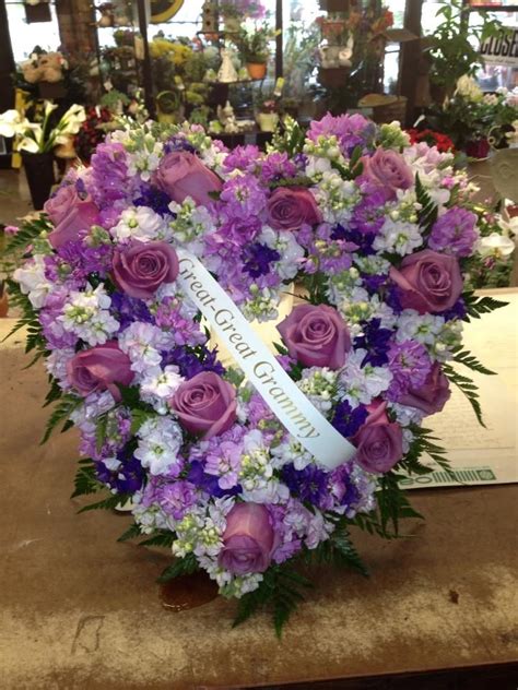 Heart Wreath for the funeral home with a banner attached designed by ...