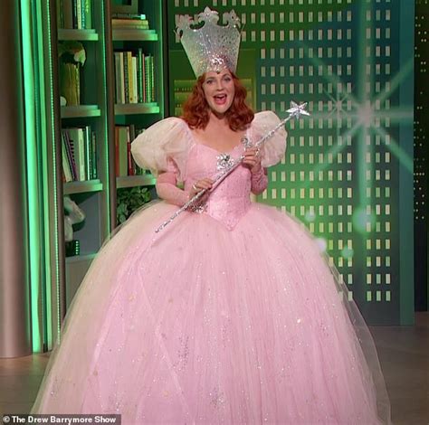 Drew Barrymore dresses up as the Glinda the Good Witch from the Wizard ...