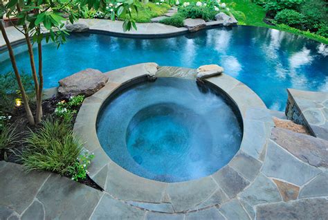 Swimming pool designs with hot tub | Hawk Haven